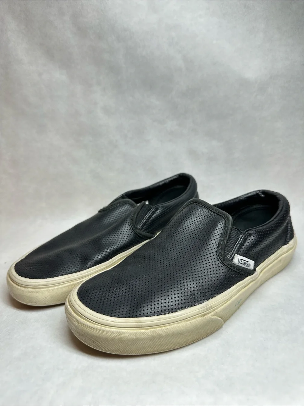 Vans Black Perforated Leather Slip-On Sneakers